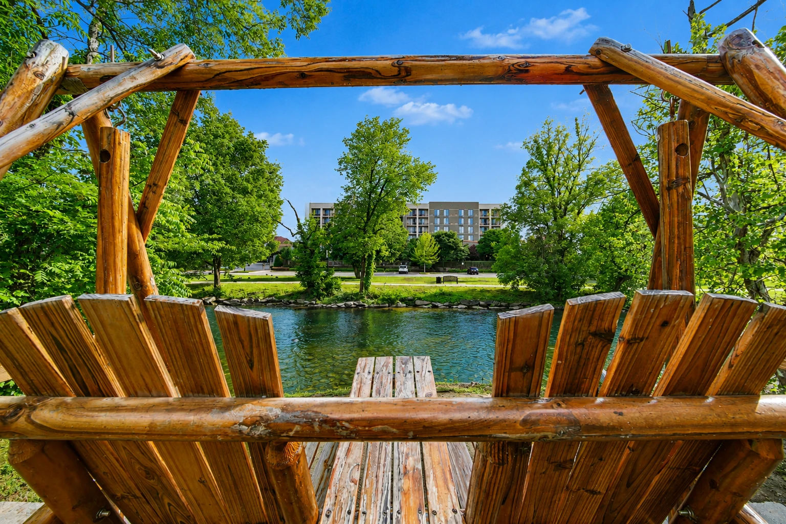 rocking chairs on Inn on the River patio looking out at Little Pigeon River