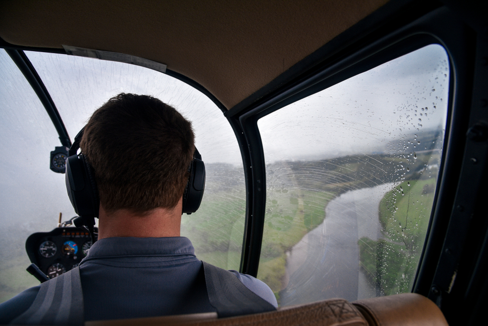 pilot flying helicopter over Smokies