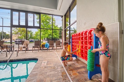 kids playing at indoor pool