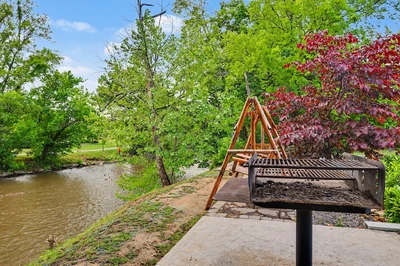 grill and seating on the river at our hotel in Pigeon Forge