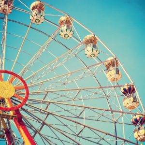 Vintage feel of ferris wheel in blue sky
