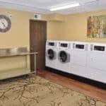 On-site laundry with washing machines and dryers
