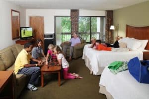 Kids playing a game in their Great Smoky Mountain hotel room.
