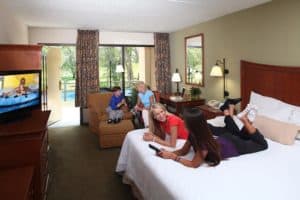 Happy guests in a Pigeon Forge hotel room.