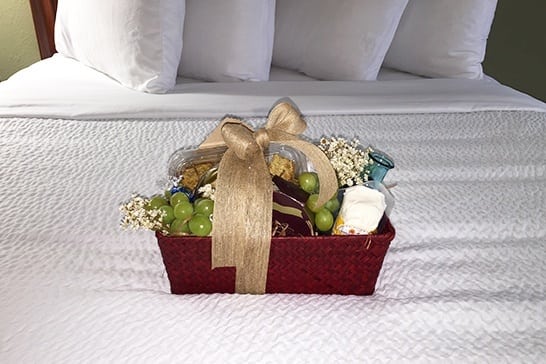 snack package on a hotel bed