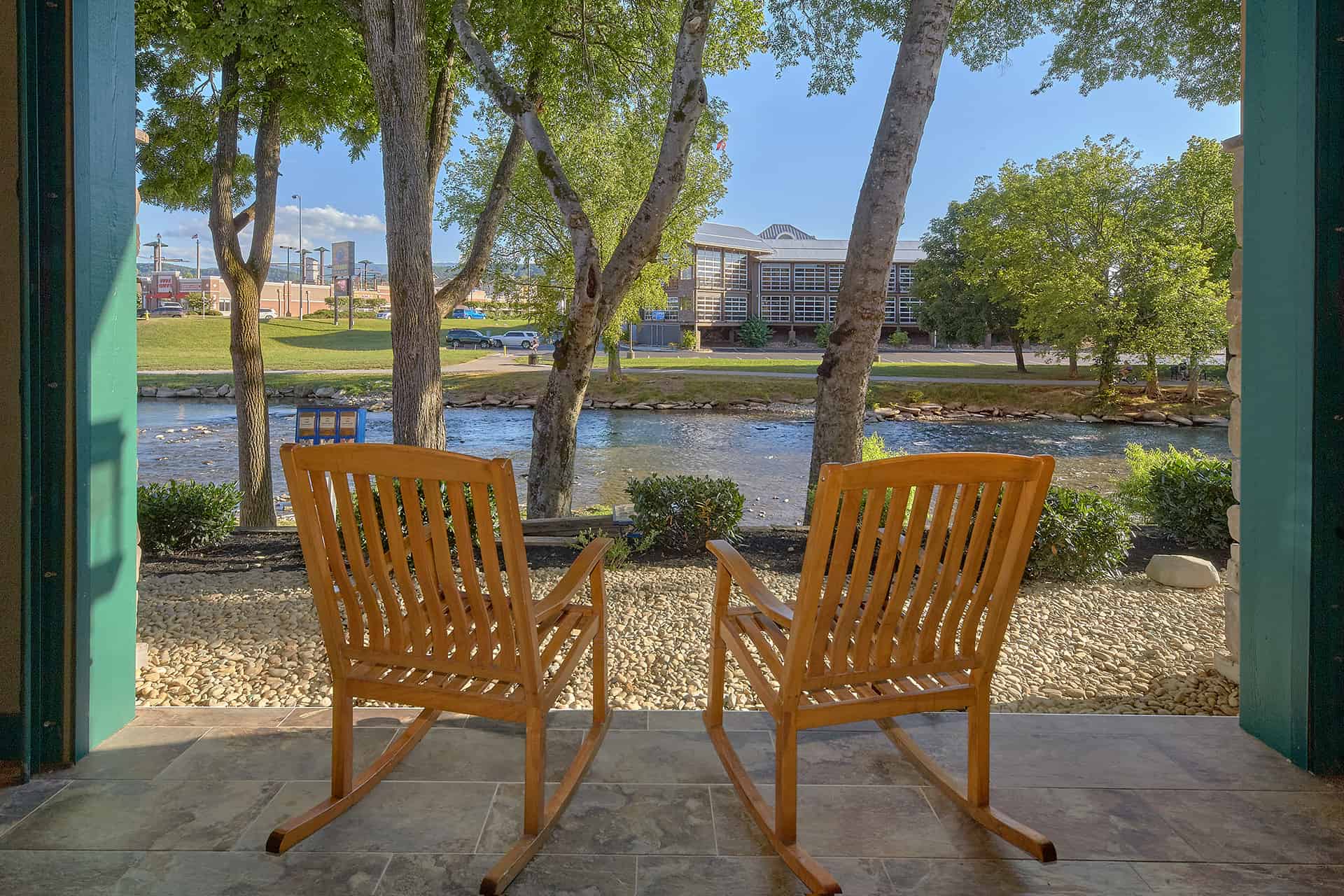 rocking chairs overlooking river