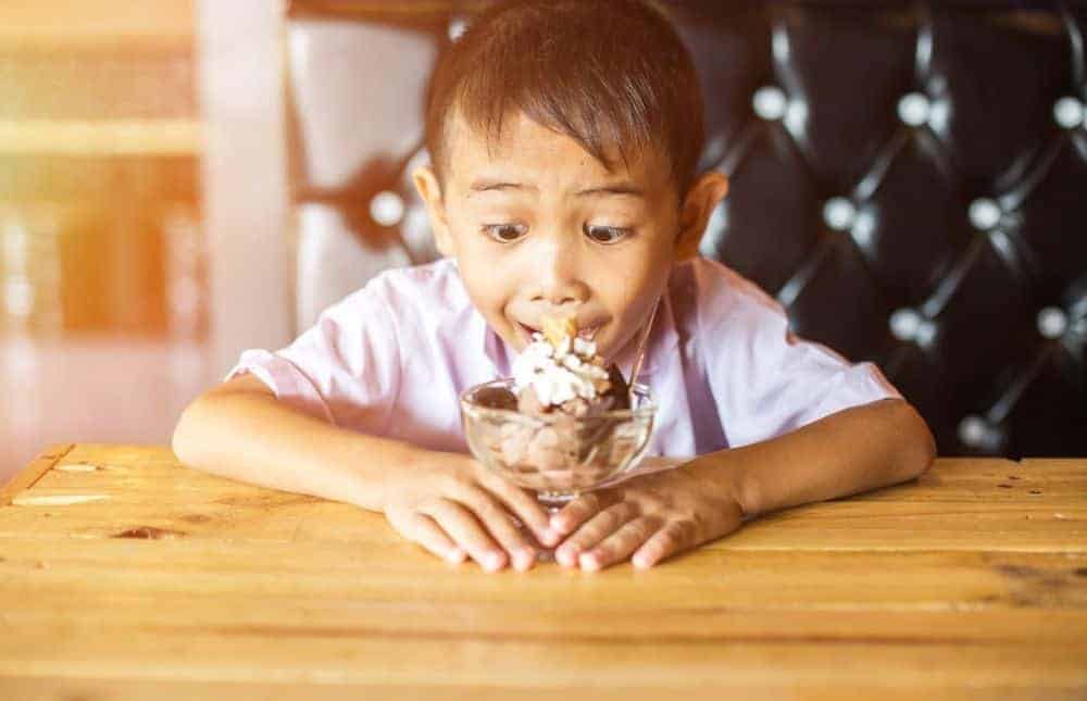 boy eating ice cream sundae