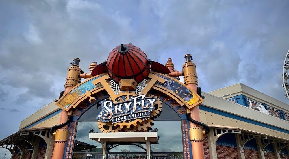 in front of skyfly soar american attraction the island